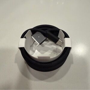 Apple USB-C to MagSafe 3 Cable in black. MacBook